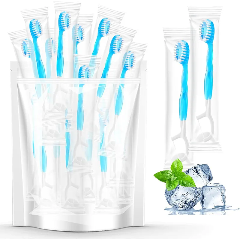 Mini -Reisezahnbürste mit Zahnpasta im Inneren